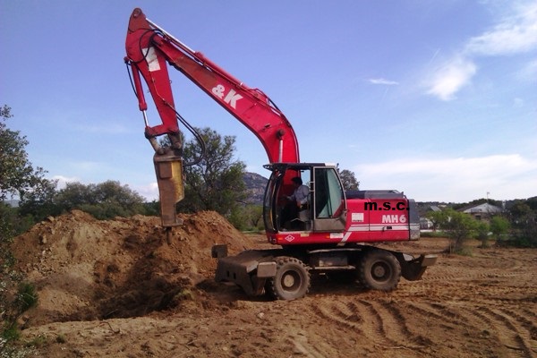 maquina excavadora martillo hidraulico